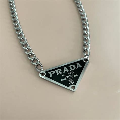 prada triangle neclace|Prada leather necklace.